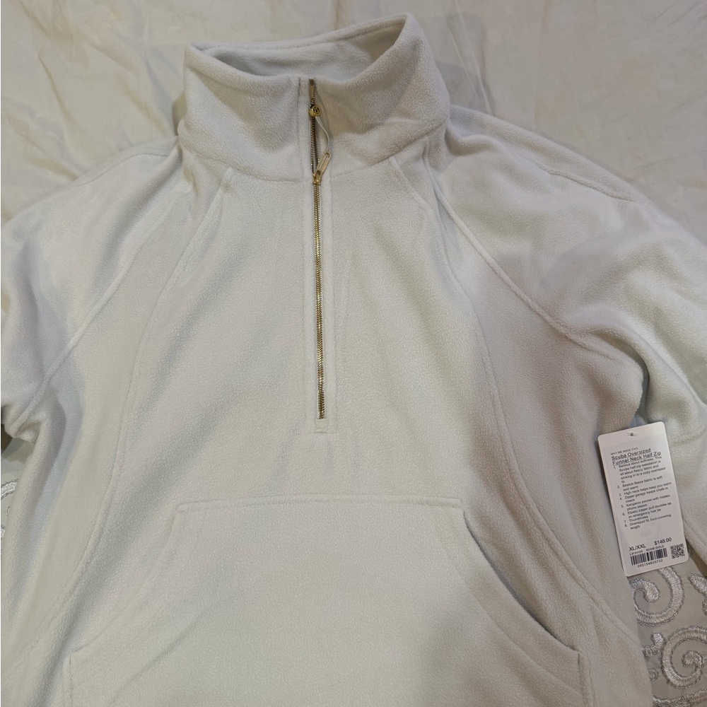 Scuba Tumbled Fleece Funnel-
Neck Half Zip
Colour Bone/Gold
Size XL/XXL - Picture 3 of 10